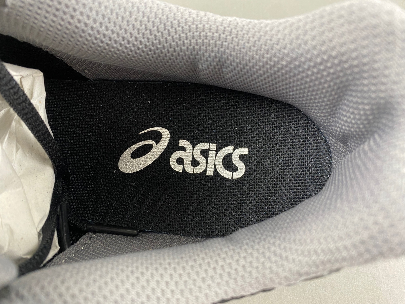 As*ic*s sneaker
