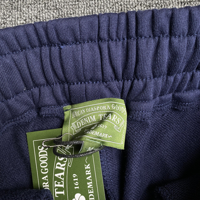 DENIM TEARS PANTS