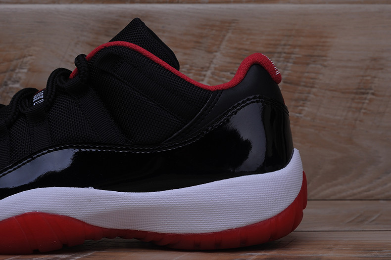 AIR JORDAN 11 RETRO LOW "BRED" BLACK/ RED mens 528895-012