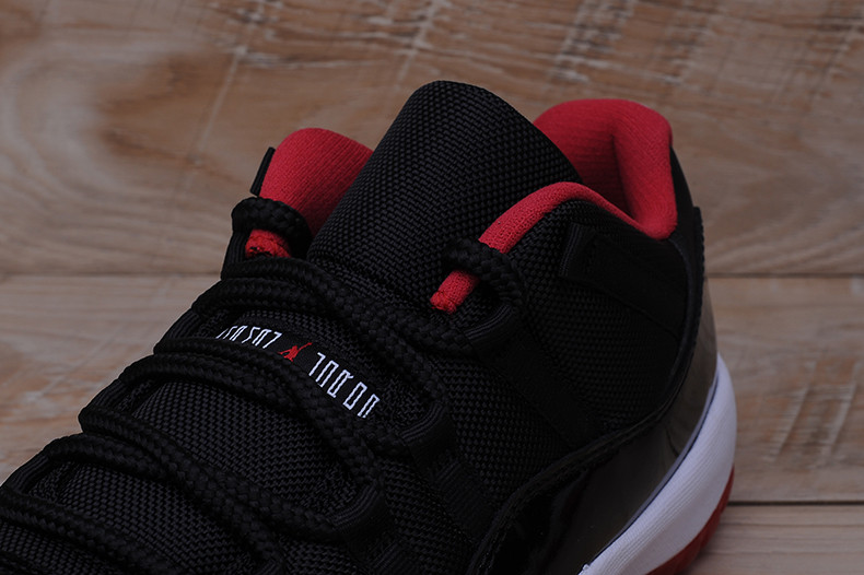AIR JORDAN 11 RETRO LOW "BRED" BLACK/ RED mens 528895-012